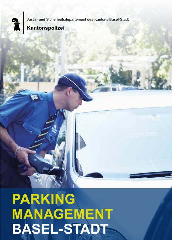 Cover Publication: A policeman controls the windshield of a parking car looking for a parking ticket.